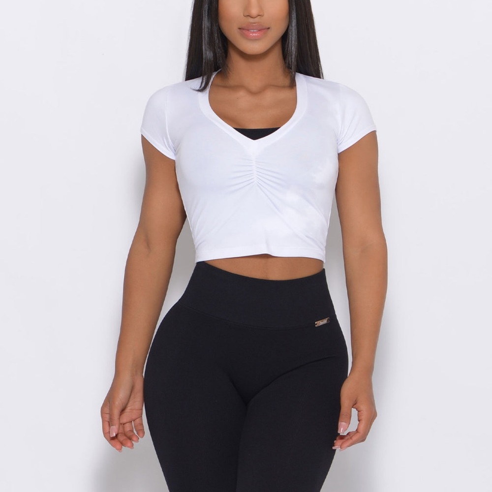 Bombshell cropped white top.